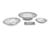 A Group of Four S. Kirk and Son Repousse Silver Table Articles