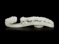 A Large and Finely Carved White Jade 'Chilong' Belt Hook