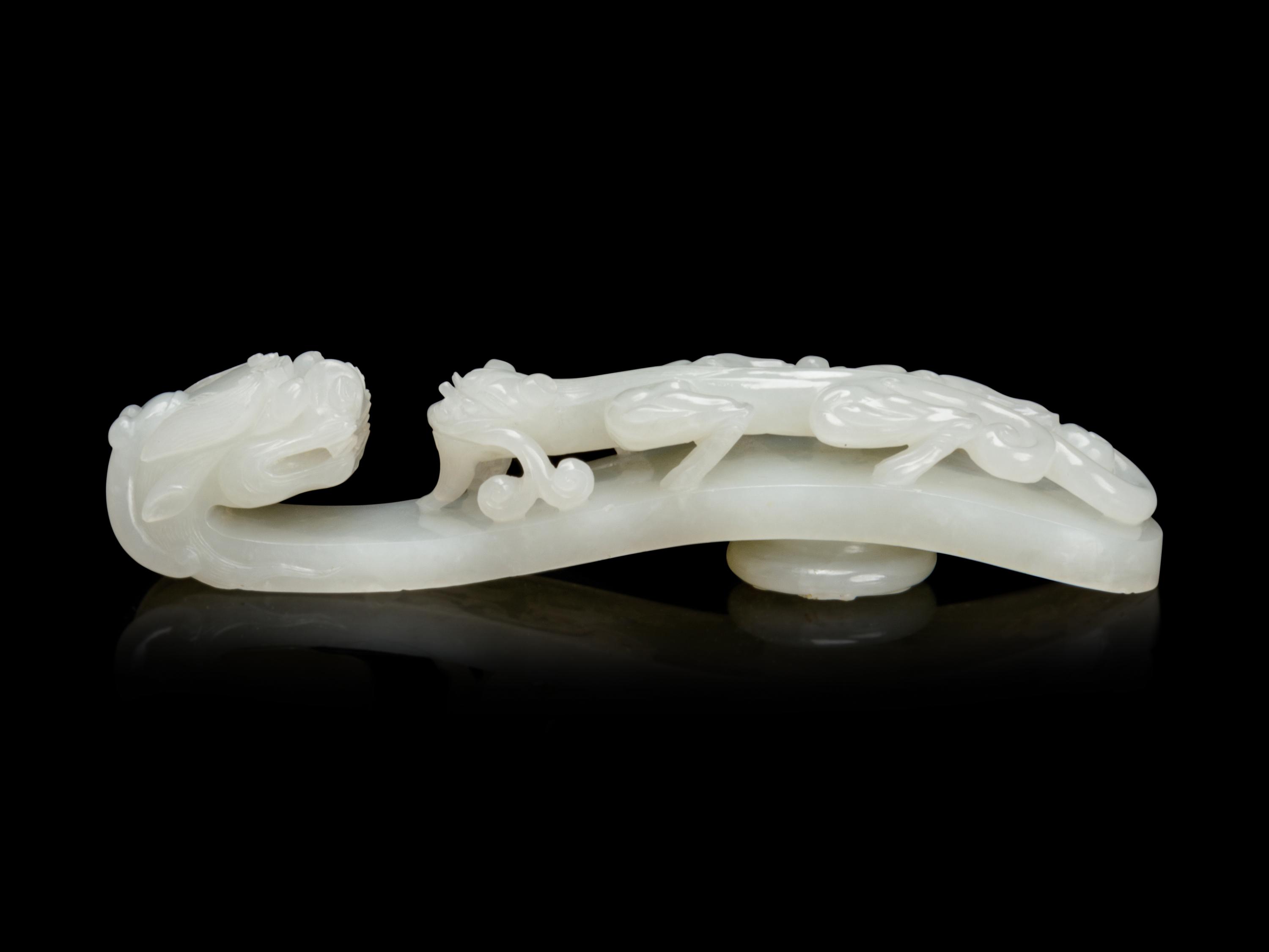 A Large and Finely Carved White Jade 'Chilong' Belt Hook