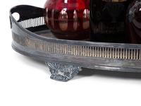 Eight Colored Glass Decanters and a Silver-Plate Galleried Serving Tray