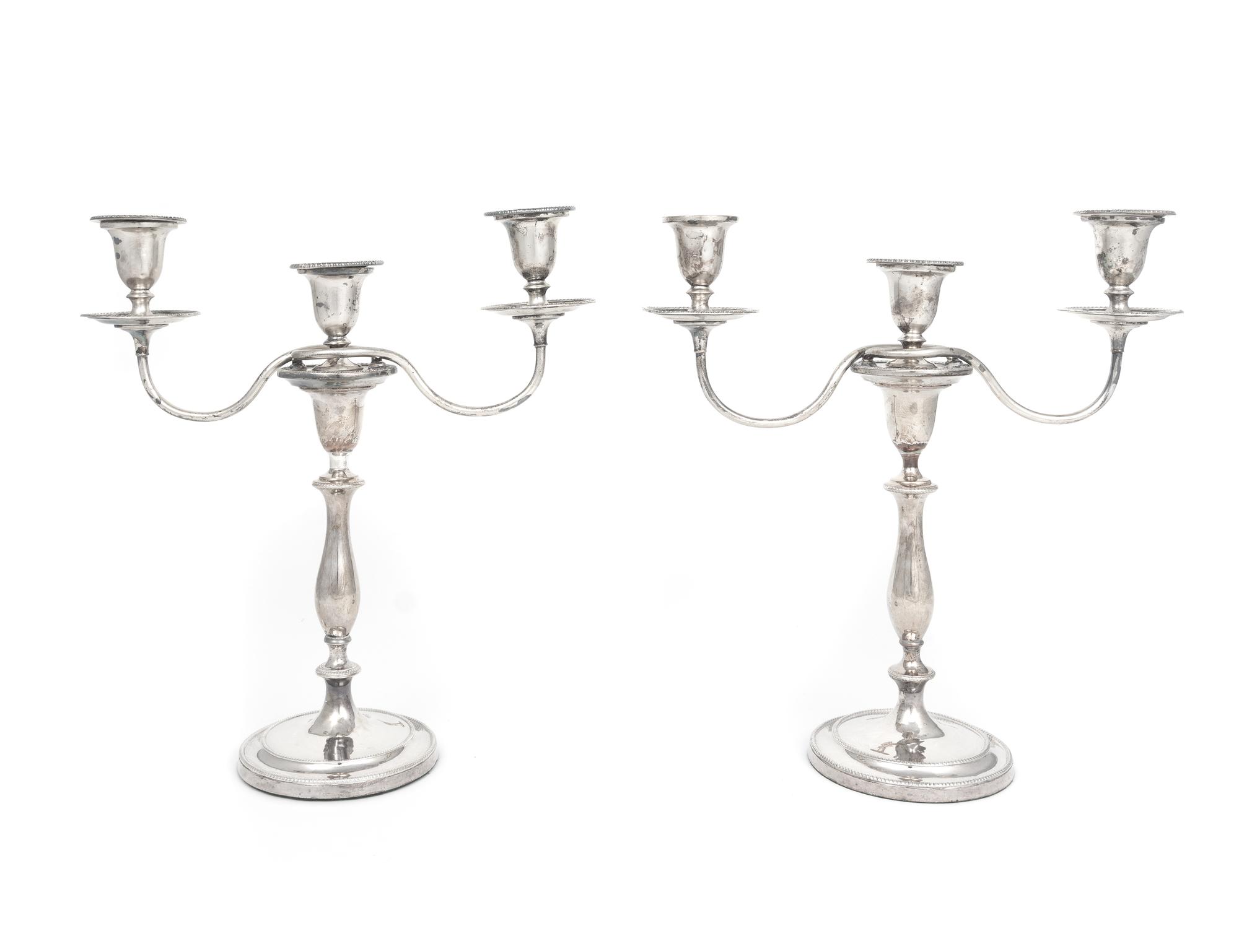 A Pair of George III Style Silver Plate Candlesticks