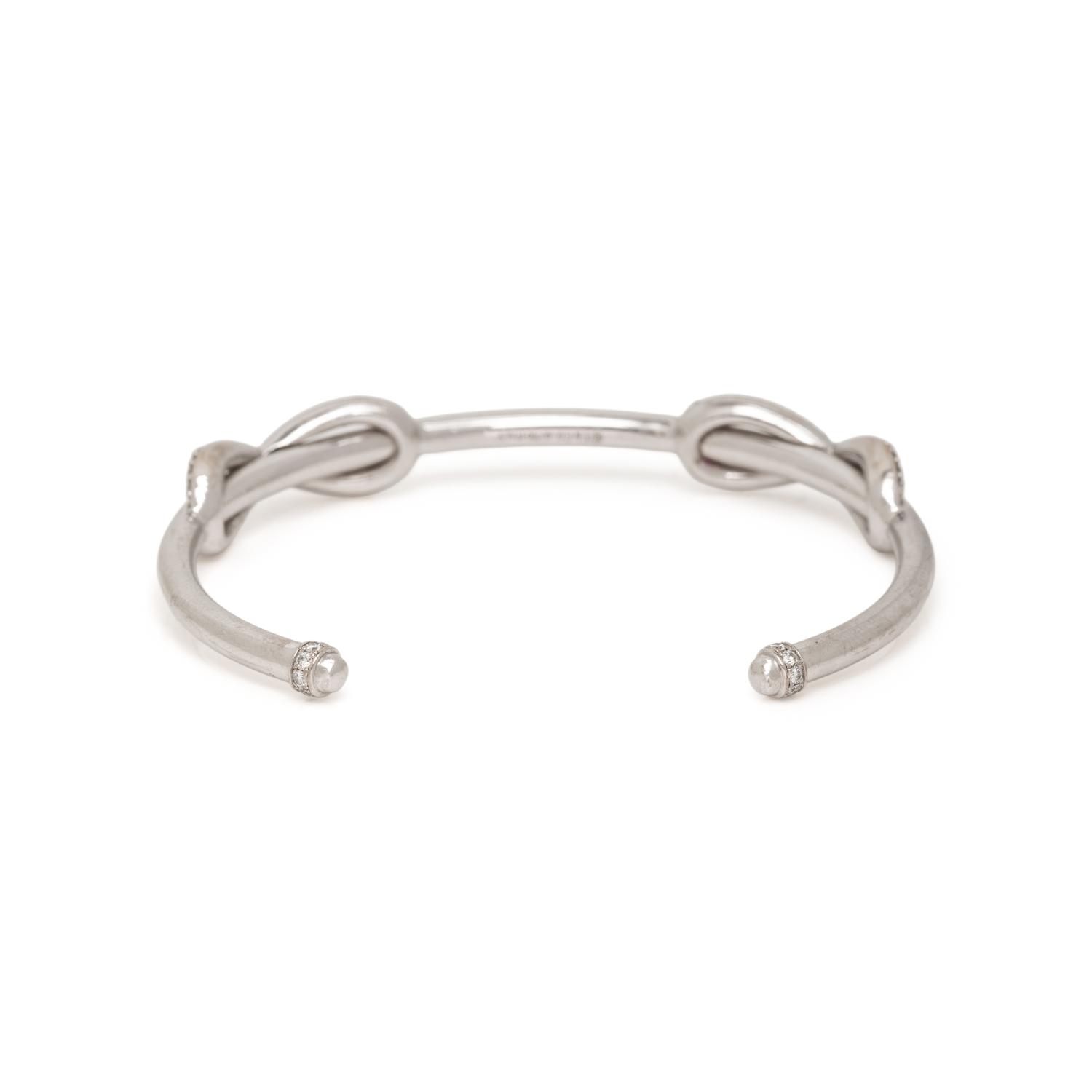 TIFFANY & CO., WHITE GOLD 'INFINITY DOUBLE DIAMOND' CUFF BRACELET