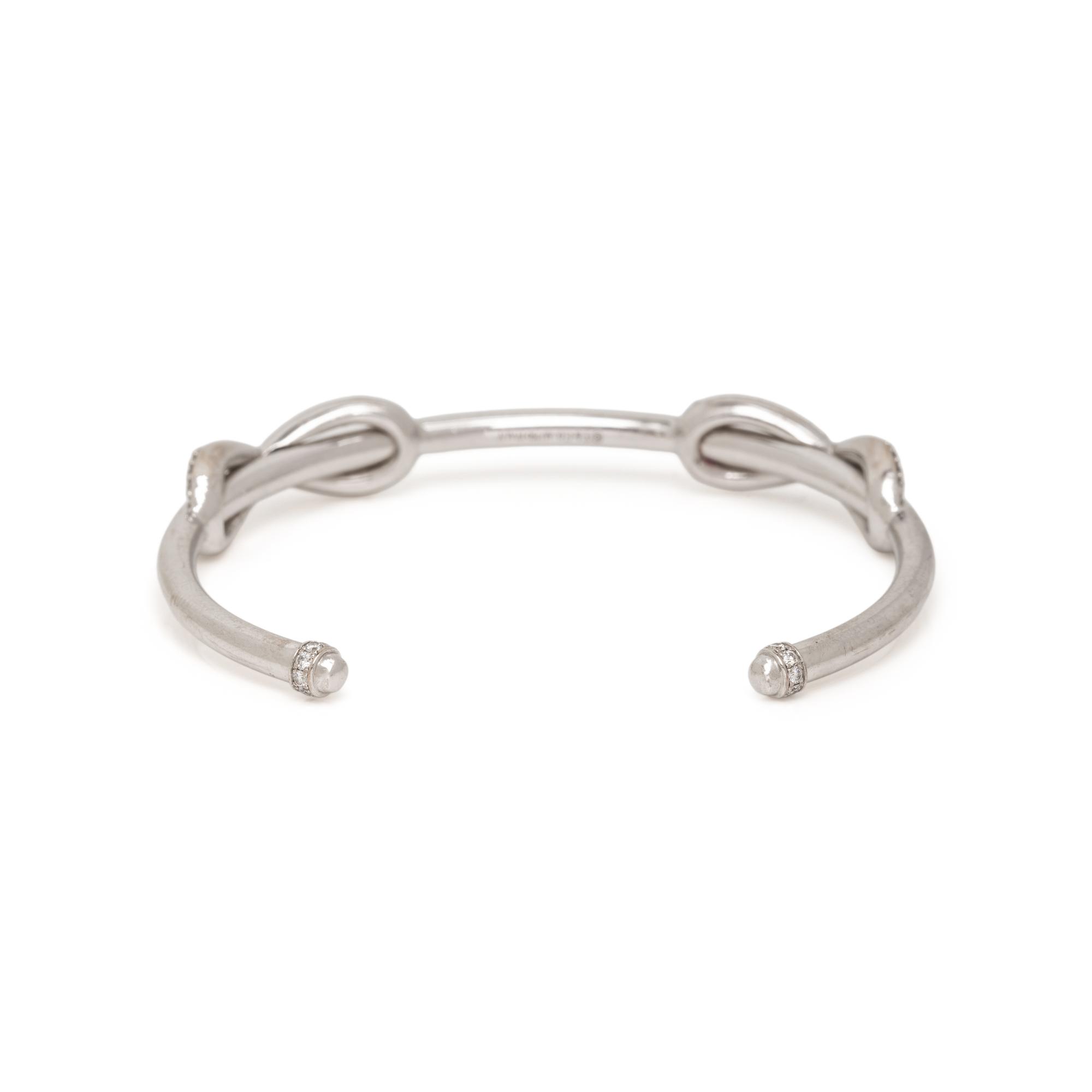 TIFFANY & CO., WHITE GOLD 'INFINITY DOUBLE DIAMOND' CUFF BRACELET