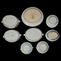 A Chinese Export "Dragons" Part Table Service, 19th Century 外銷粉彩龍紋盤一組十五件