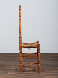 A William and Mary Style Turned and Pierced Carved Banister-Back Rush Seat Side Chair