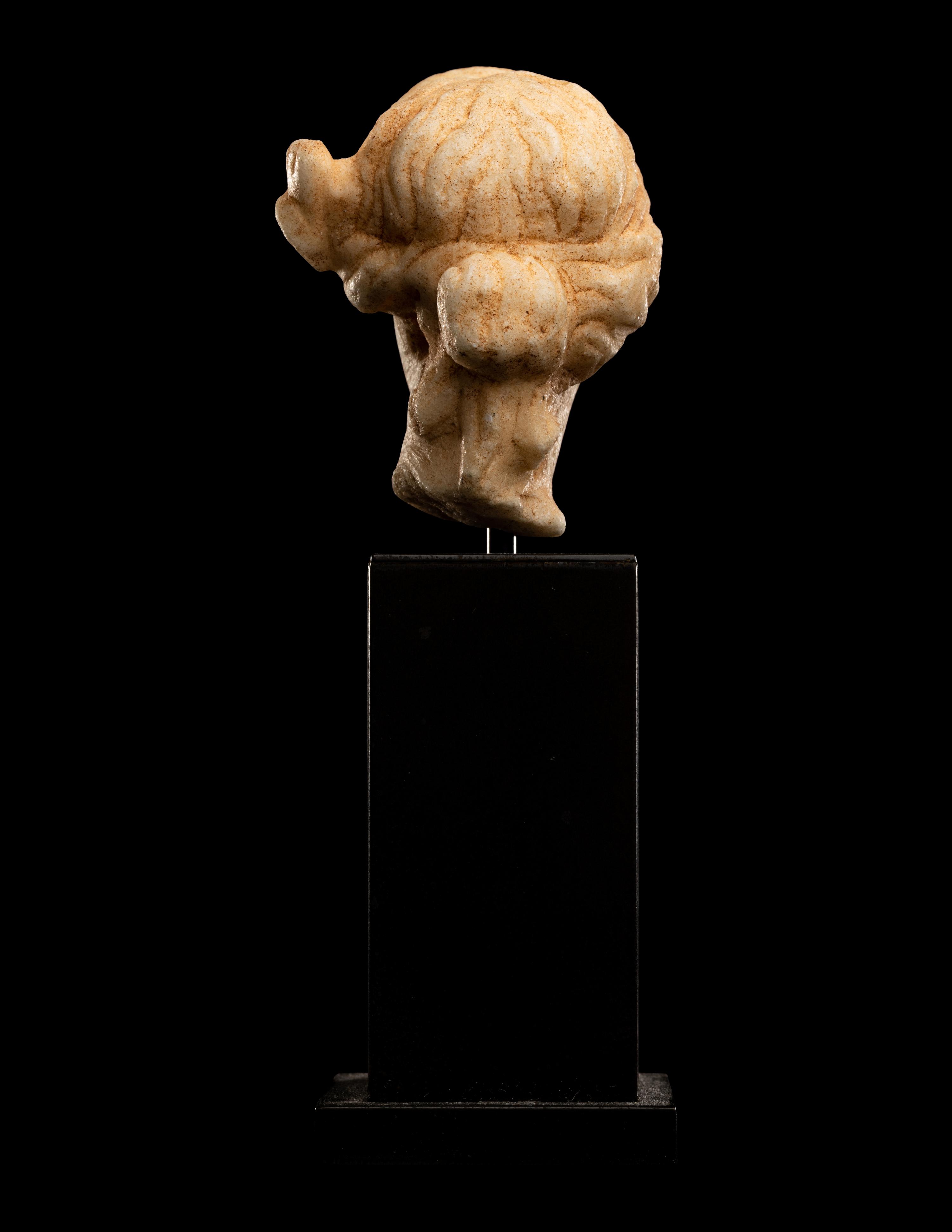A Roman Marble Head of a Woman