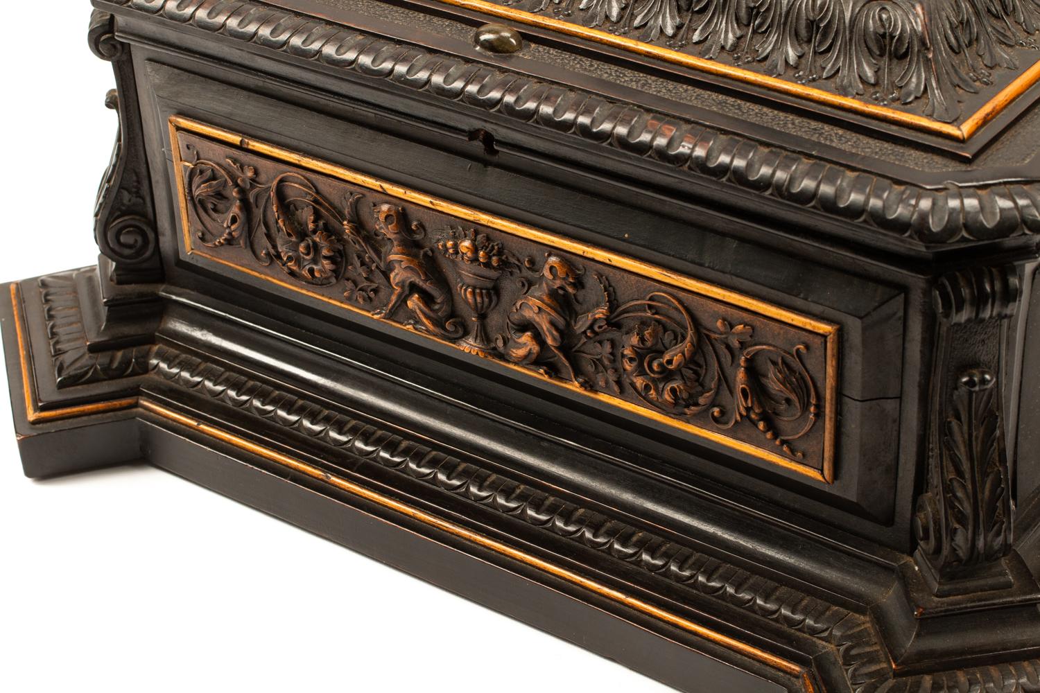 An Austrian Carved and Ebonized Wood Table Casket with a Lion