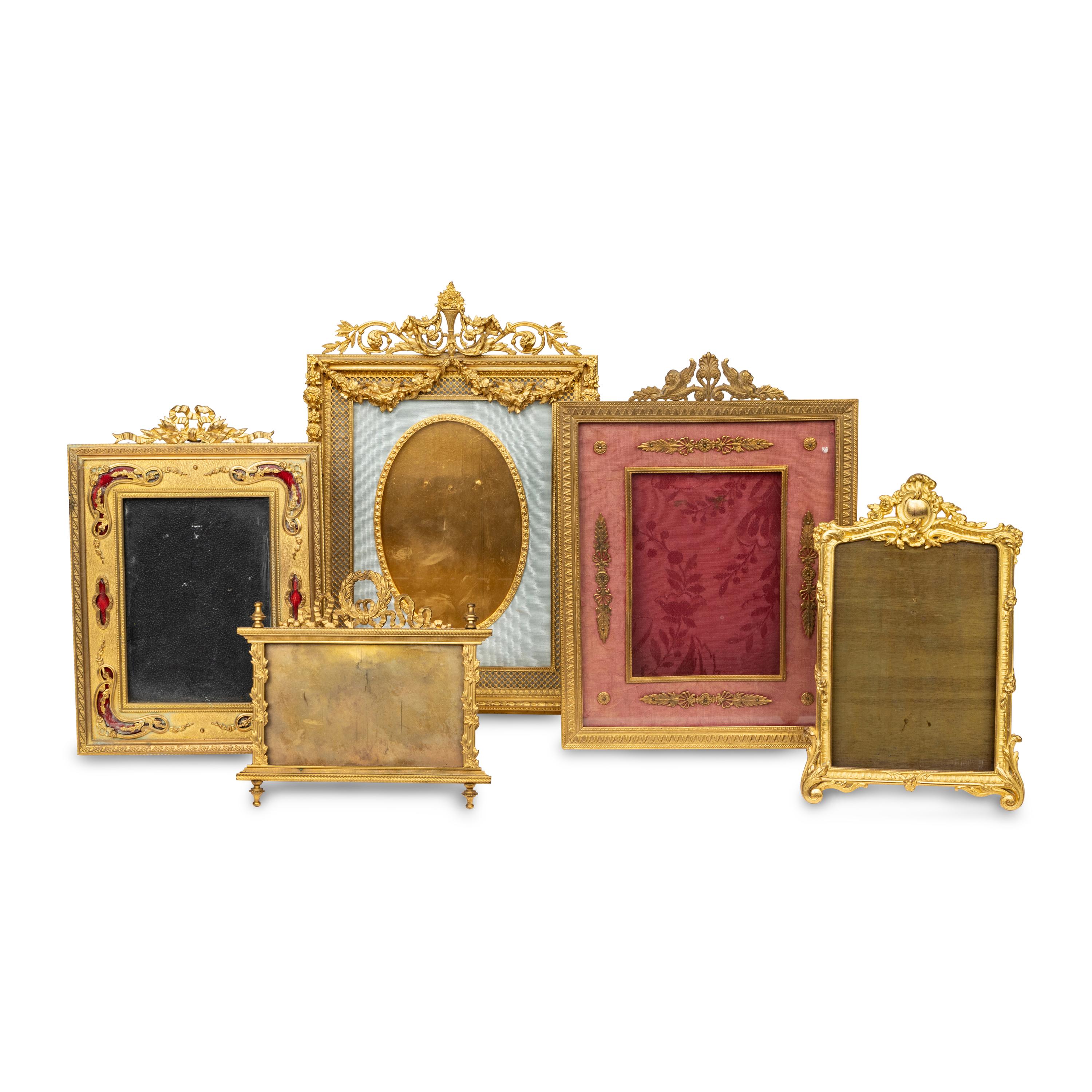 A Group of Twenty-Two Gilt Metal, Bronze and Silver-Plate Picture Frames