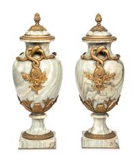 A Pair of French Gilt Bronze-Mounted Marble Urns