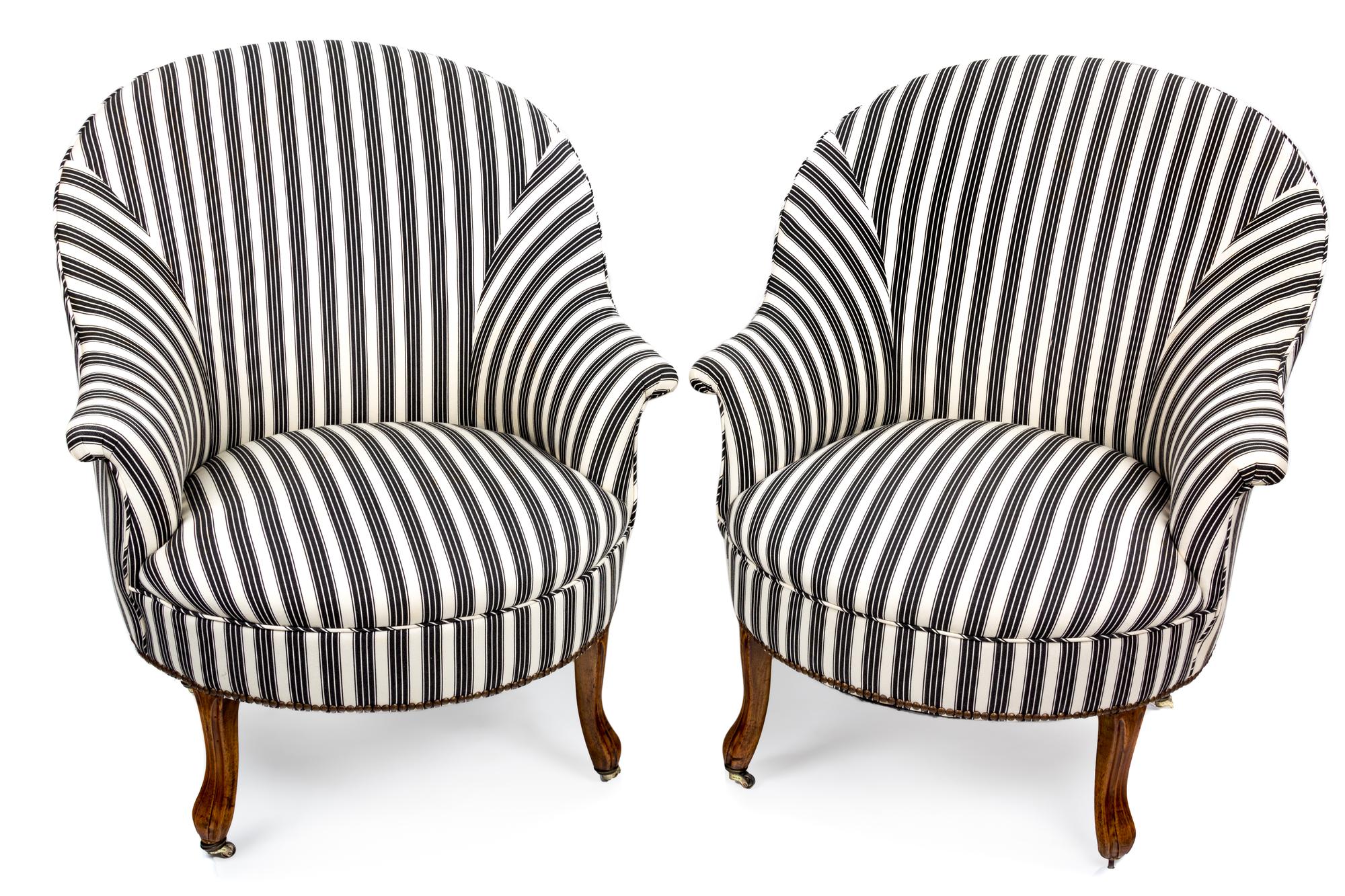 A Pair of Victorian Style Fruitwood and Upholstered Tub-Back Chairs Height 33 inches.