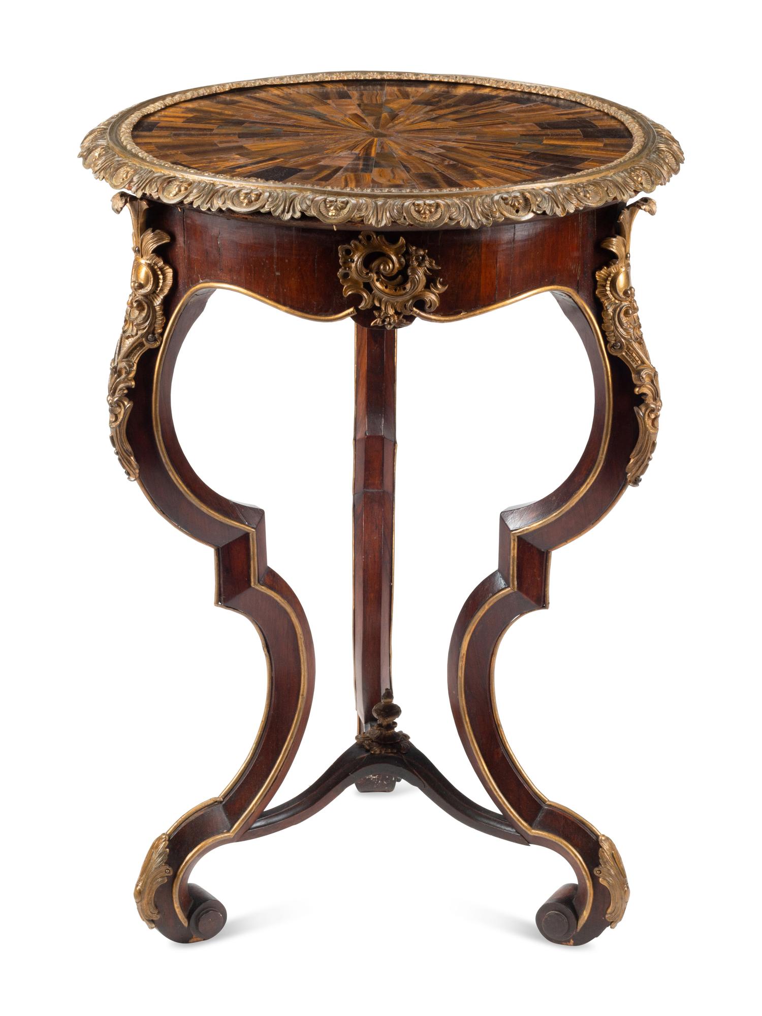 A Napoleon III Gilt Bronze and Inlaid Tiger's Eye Table