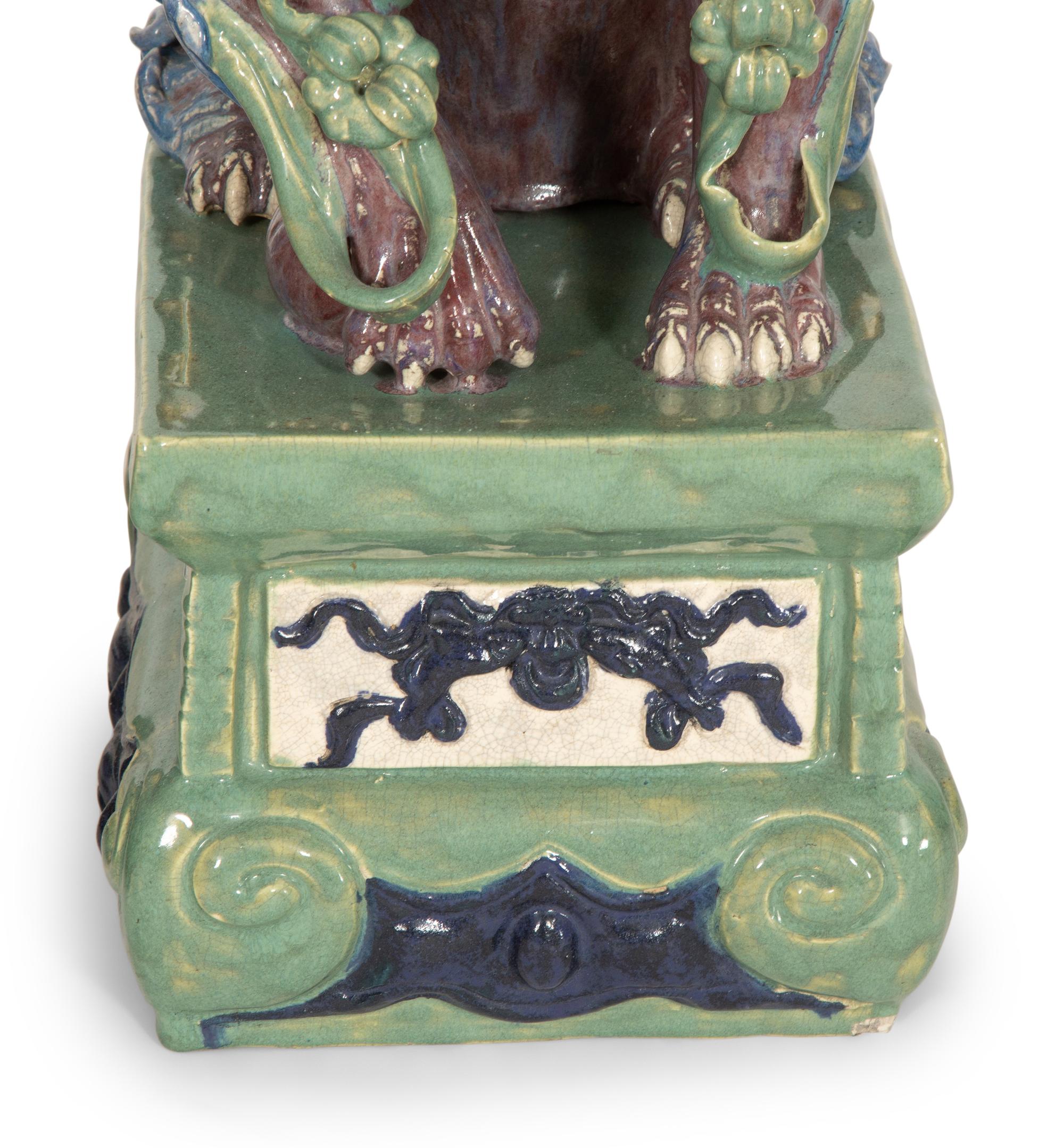A Pair of Glazed Earthenware Temple Guardians