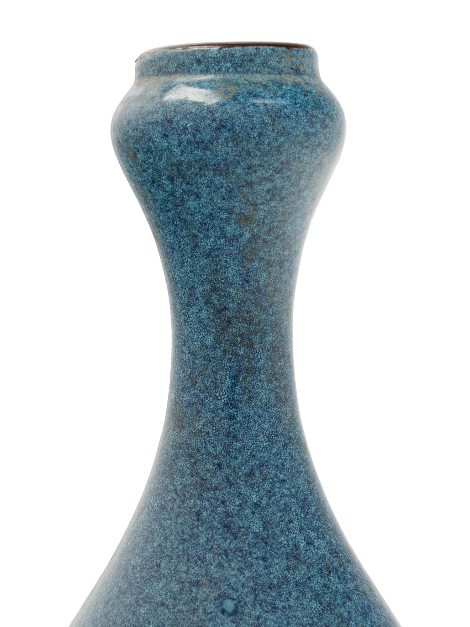Four Chinese Monochrome Glazed Porcelain Bottle Vases