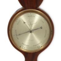 An English Mahogany Marquetry Wheel Barometer Thermometer