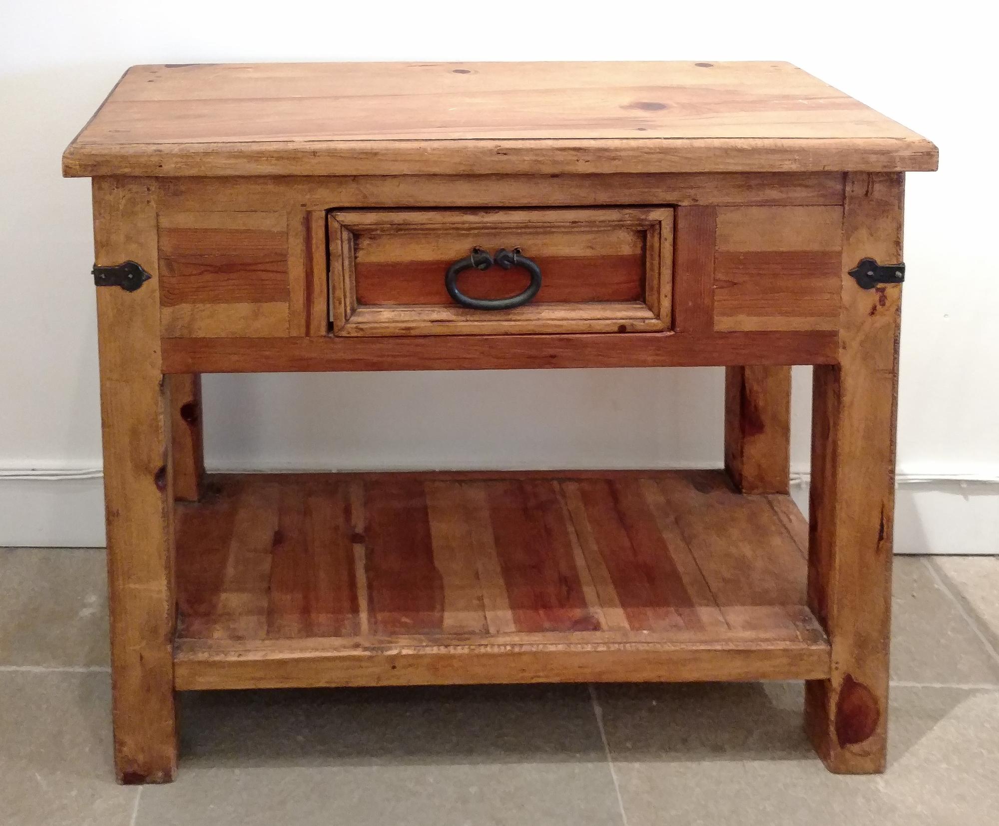 A Pine Side Table Height 31 1/2 x width 39 1/2 inches.
