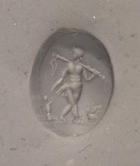 A Roman Rock Crystal Ring stone with the Gods Silenus and Infant Dionysus