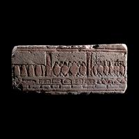 An Egyptian Polychrome Relief with Offering to the Aten