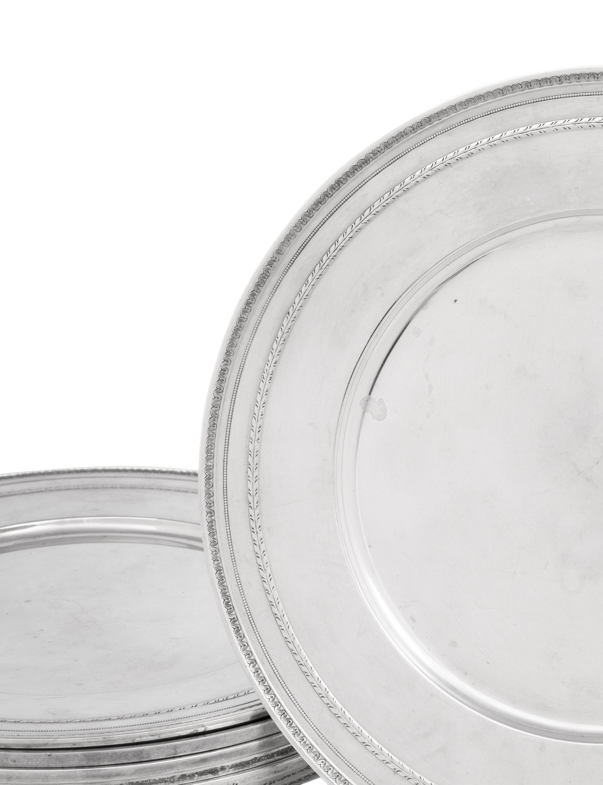 A Set of Eight American Silver Chargers