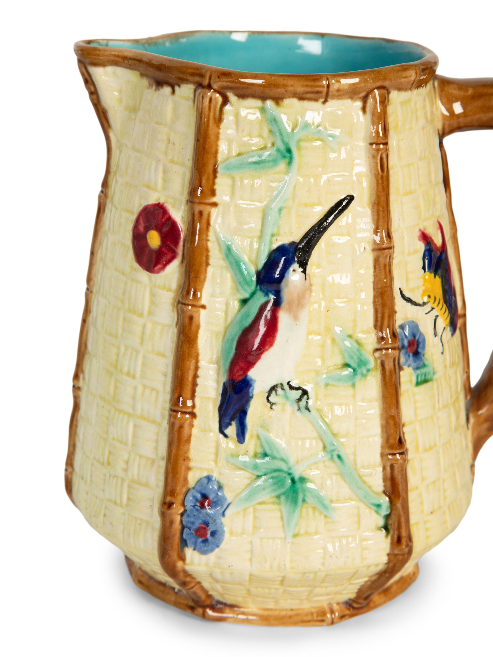 A Holdcroft English Majolica Turquoise Dogwood Pitcher and Cup and a Fielding Majolica Hummingbird Pitcher — 19th Century