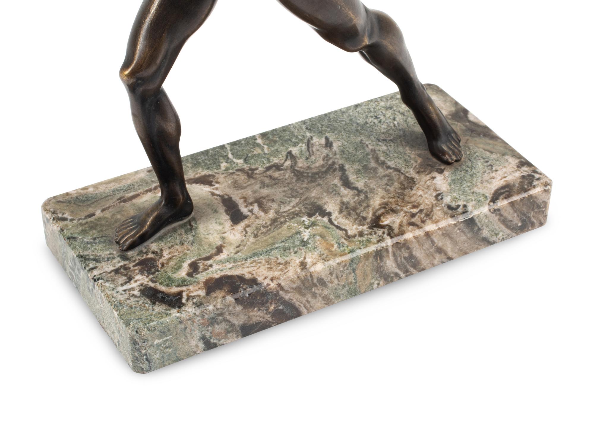 A Grand Tour Bronze Figure on a Marble Base