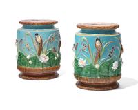 An assembled pair of English majolica "bird and pond" garden seat / stools, George Jones & Sons, Stoke, Stoke-on-Trent, bearing date marks for 1874-1875