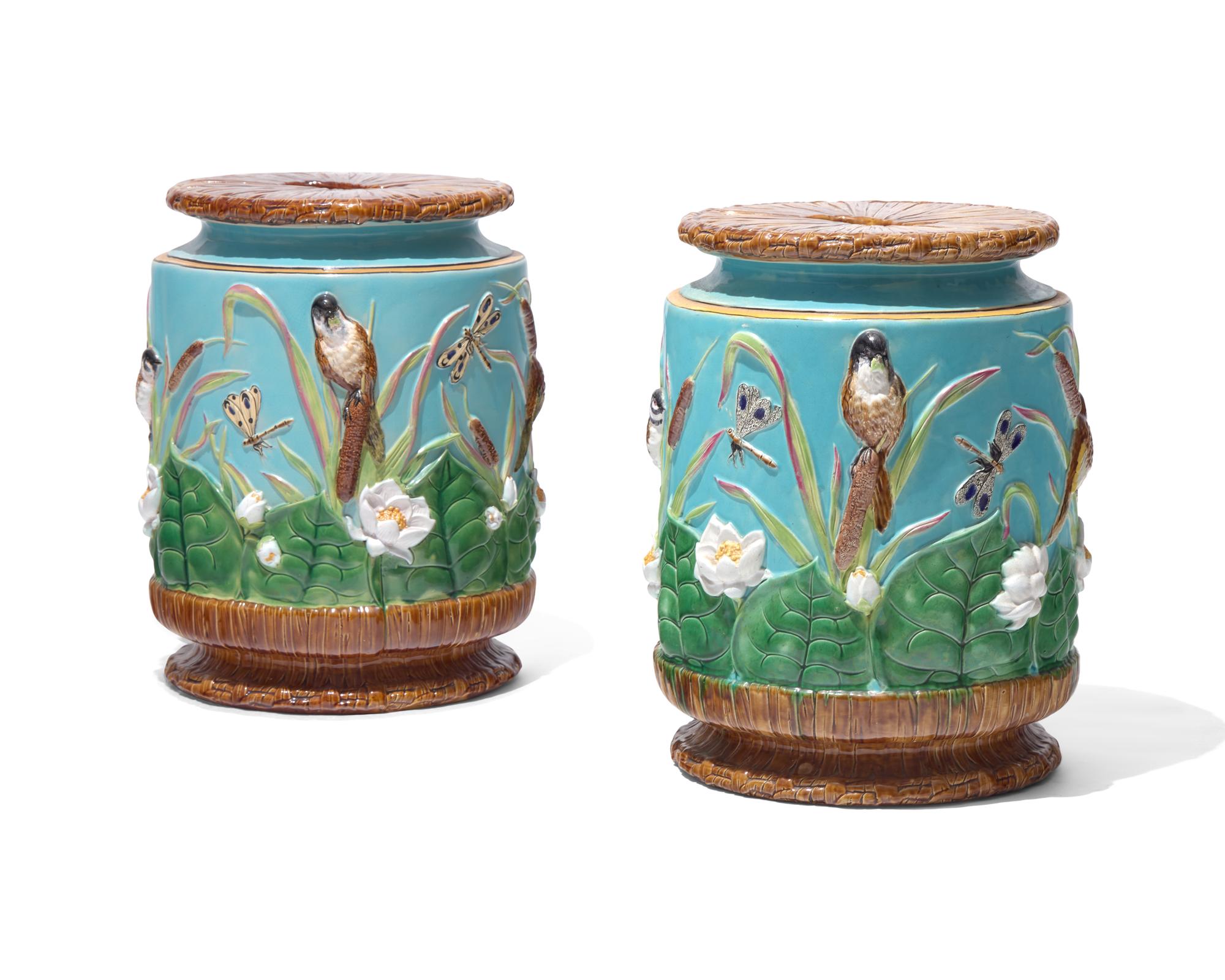 An assembled pair of English majolica "bird and pond" garden seat / stools, George Jones & Sons, Stoke, Stoke-on-Trent, bearing date marks for 1874-1875