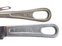 [MILITARIA]. World War II and Korean War-era canteens, canteen covers, and mess kits.
