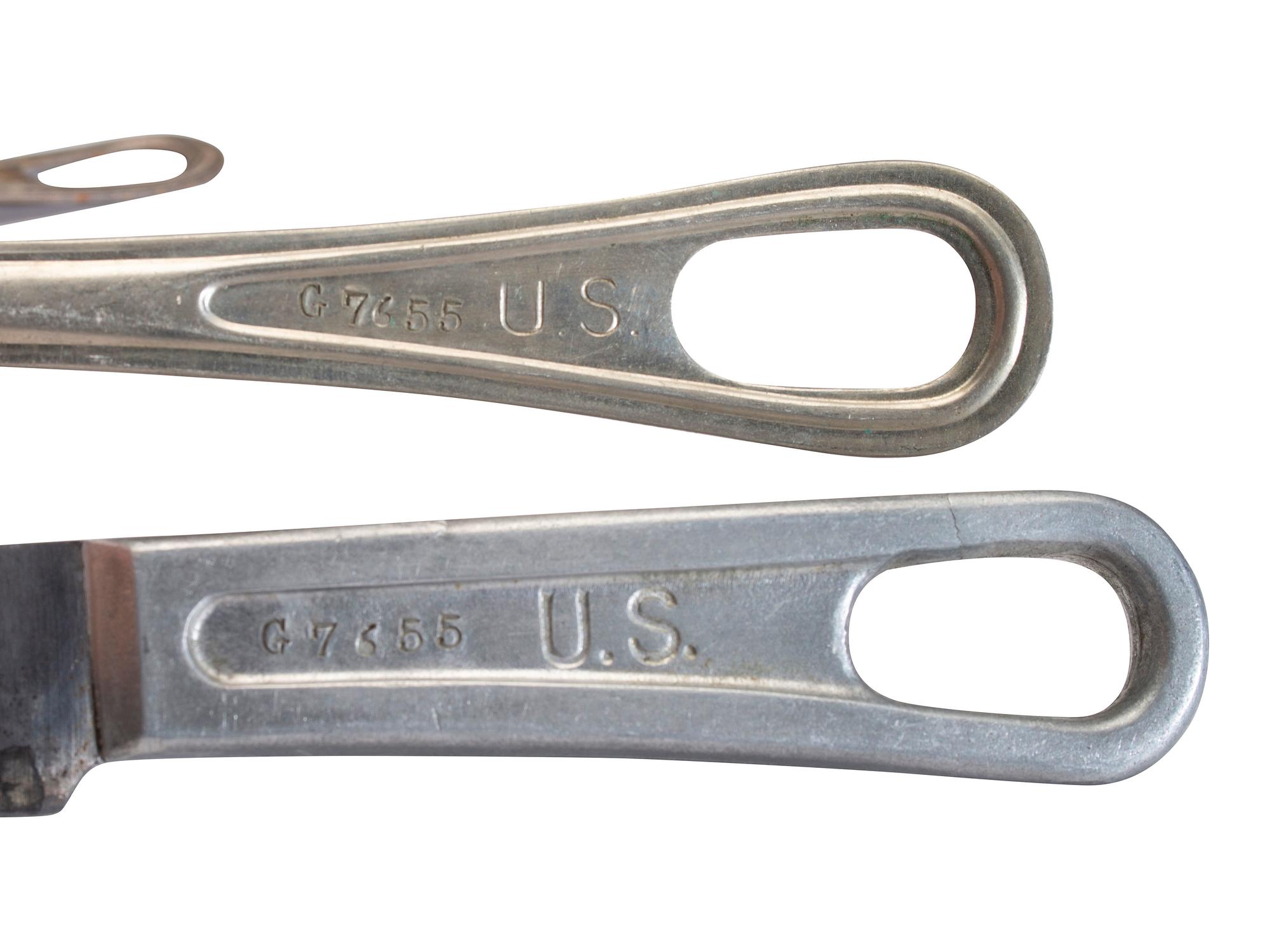 [MILITARIA]. World War II and Korean War-era canteens, canteen covers, and mess kits.