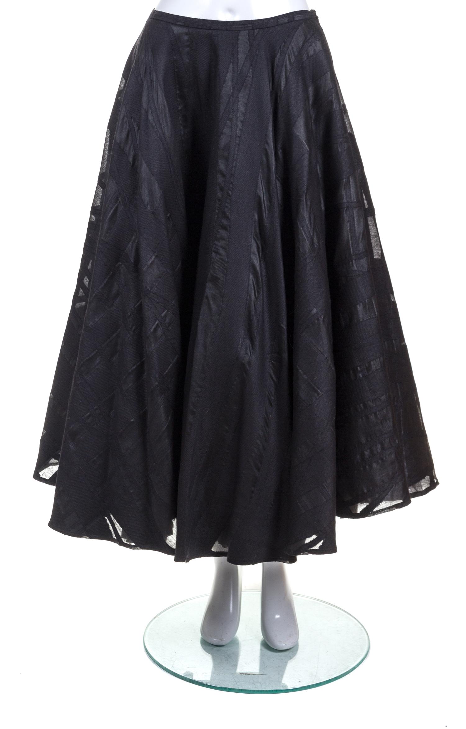 A Rebecca Moses Black Wool Skirt, Size 10.