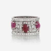 An Art Deco diamond, ruby, and platinum wide band