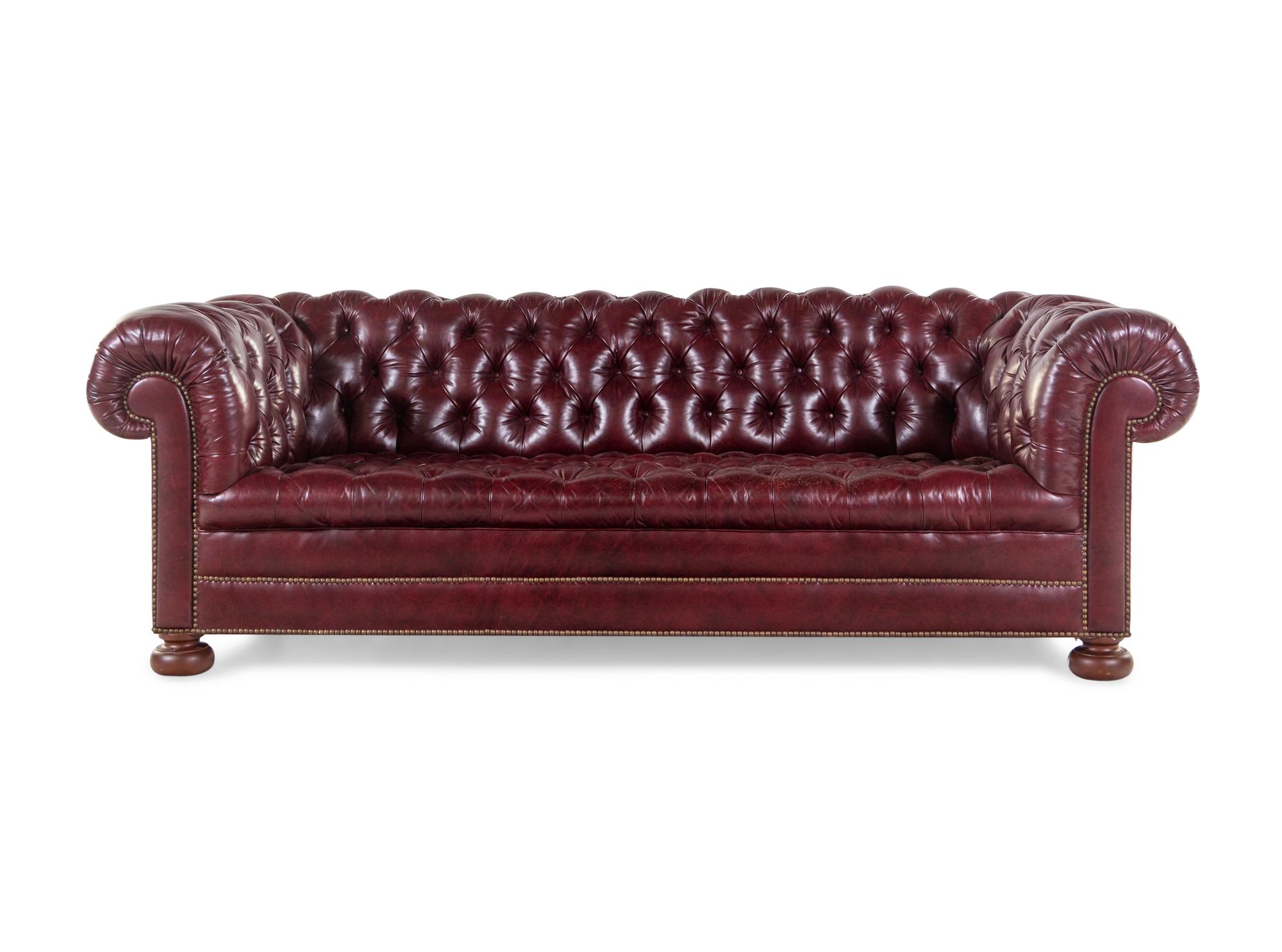 A Tufted Faux Leather Upholstered Chesterfield Sofa