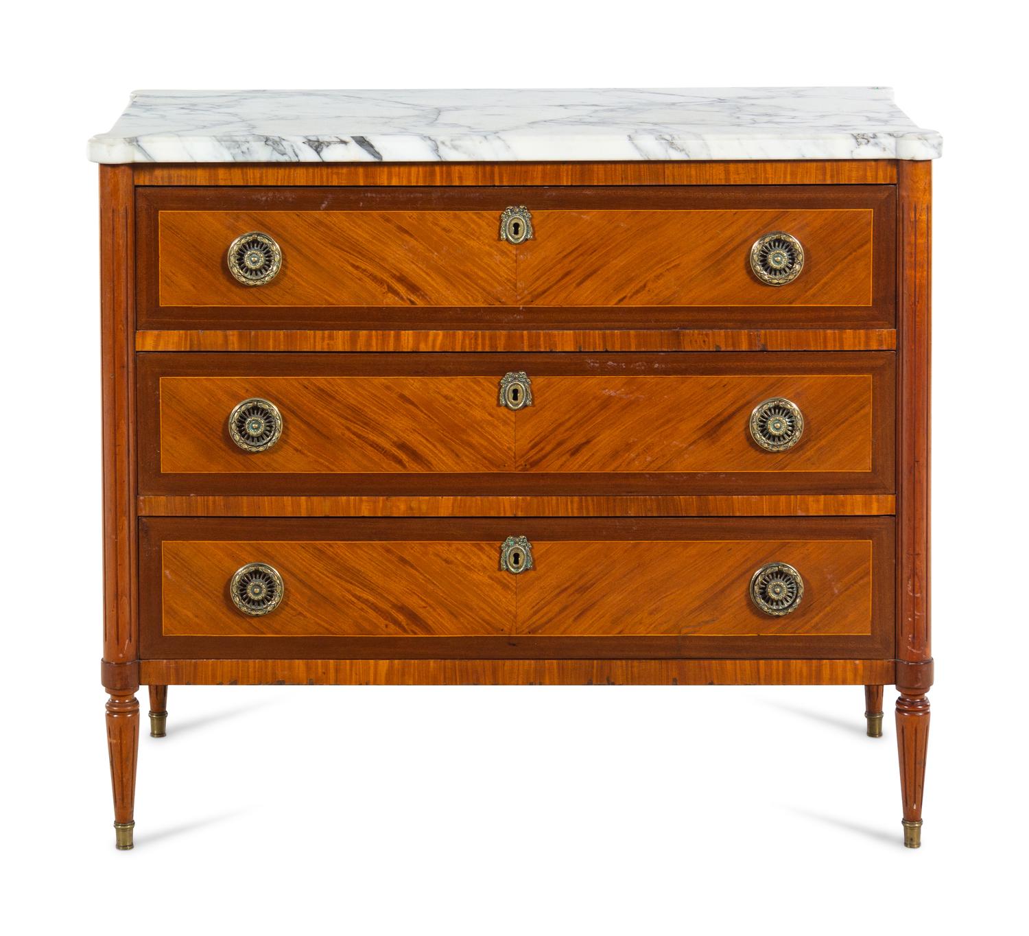 A Louis XVI Style Mahogany and Satinwood Marble-Top Commode