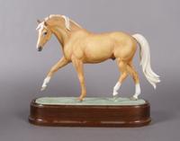 A Royal Worcester Figure of a Horse, Height overall 9 3/4 inches.