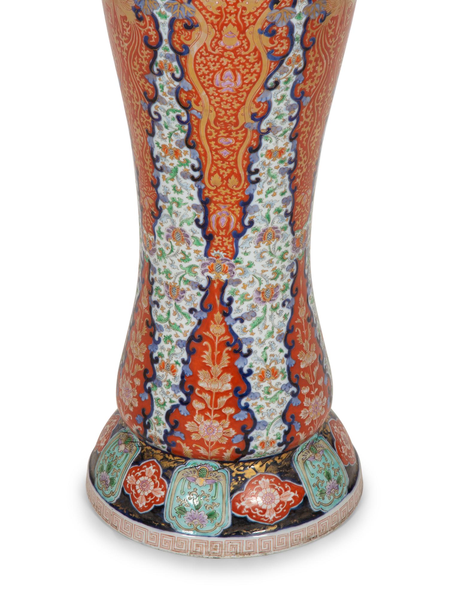 A Japanese Porcelain Jardinière and Pedestal