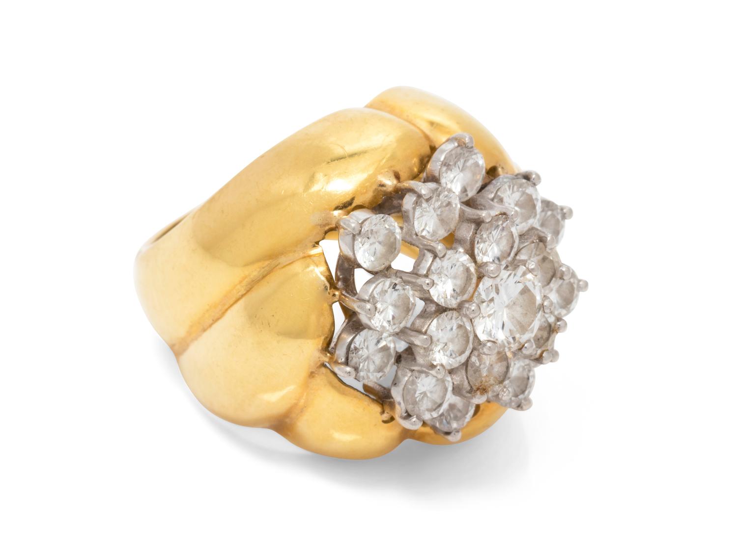 An 18 Karat White Gold and Diamond Ring,