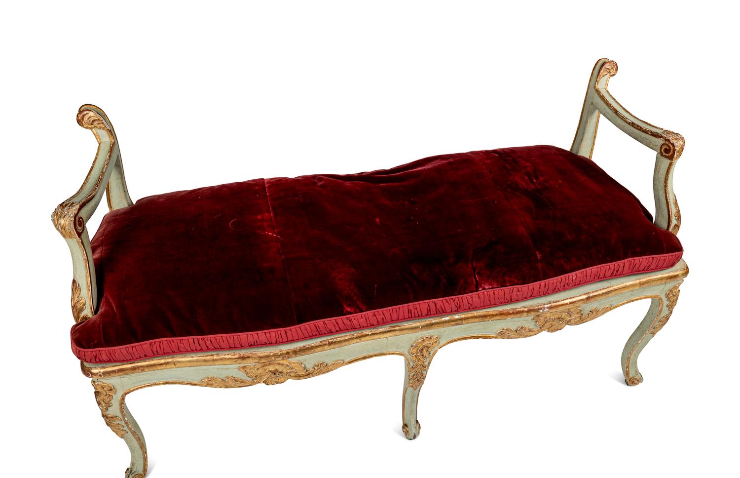 A Pair of Louis XV Green-Painted and Parcel-Gilt Cane Seat Window Benches