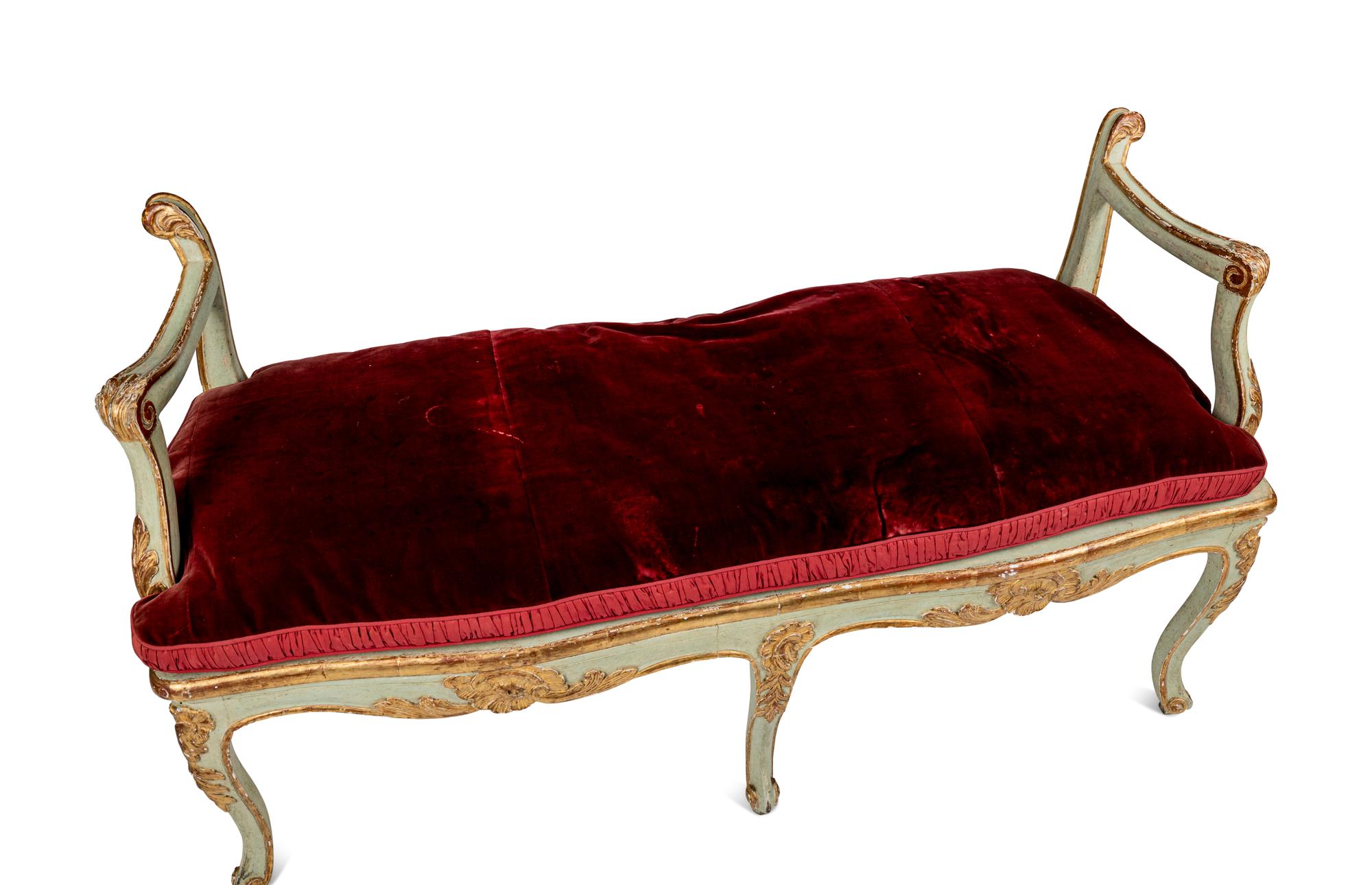 A Pair of Louis XV Green-Painted and Parcel-Gilt Cane Seat Window Benches