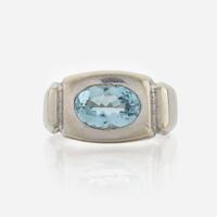 A fourteen karat white gold contemporary aquamarine ring