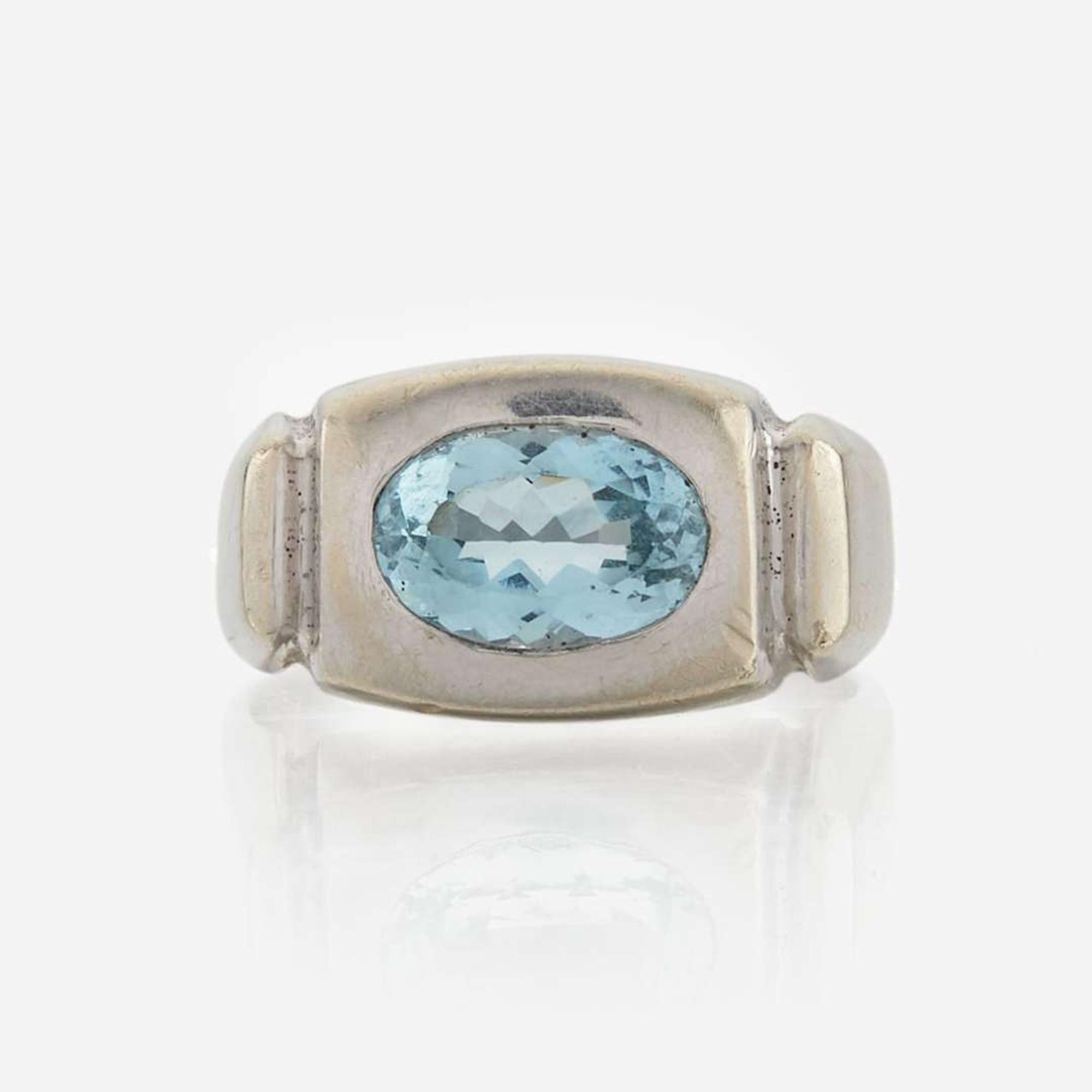 A fourteen karat white gold contemporary aquamarine ring