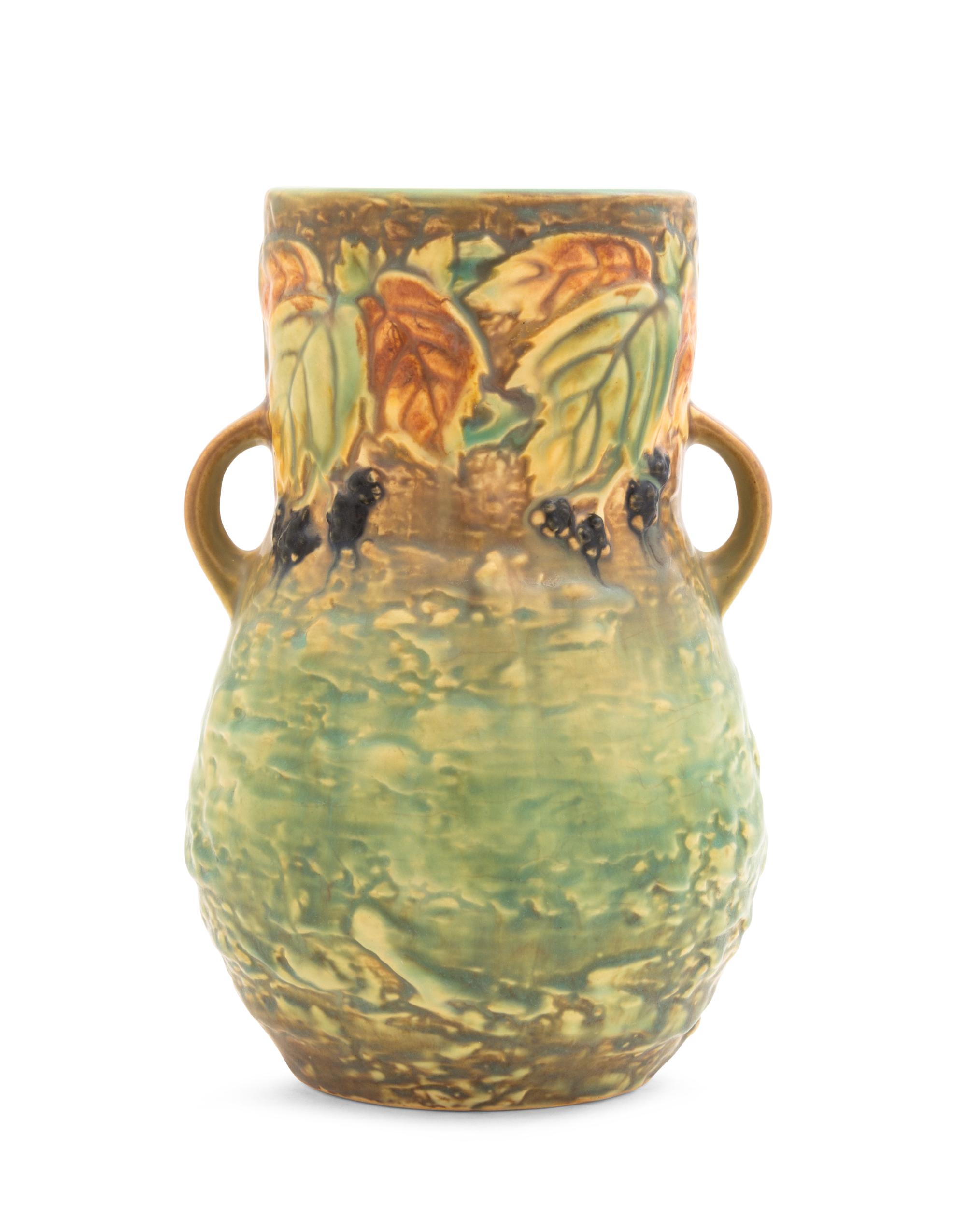 A Roseville Blackberry Pottery Vase Height 8 1/4 inches.