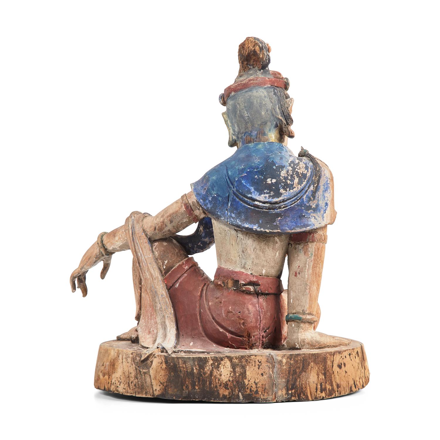 A Chinese Carved and Painted Wood Figure of Guanyin, Ming Dynasty or Earlier 明或更早 木雕彩繪水月觀音