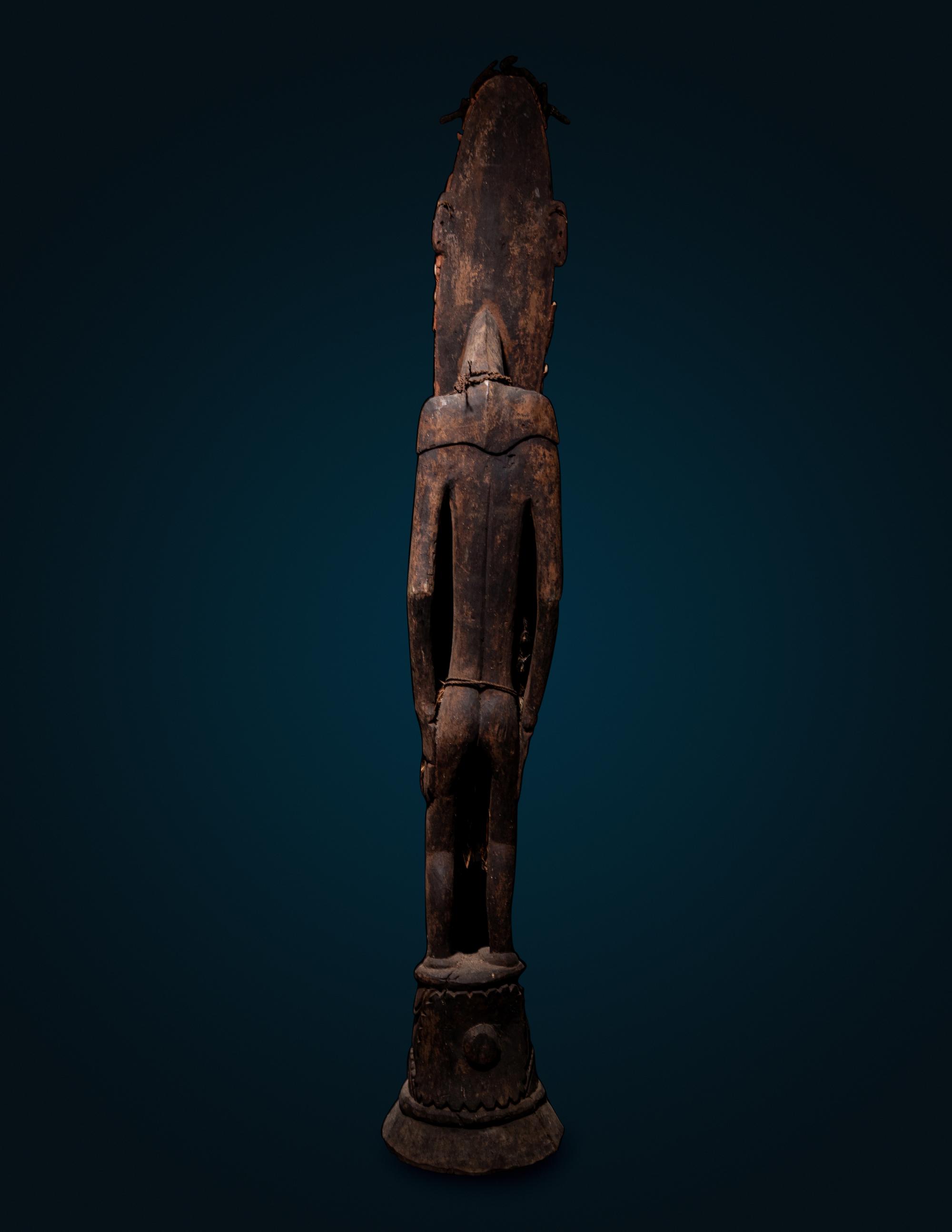 A Kanganamon Wood Standing Figure