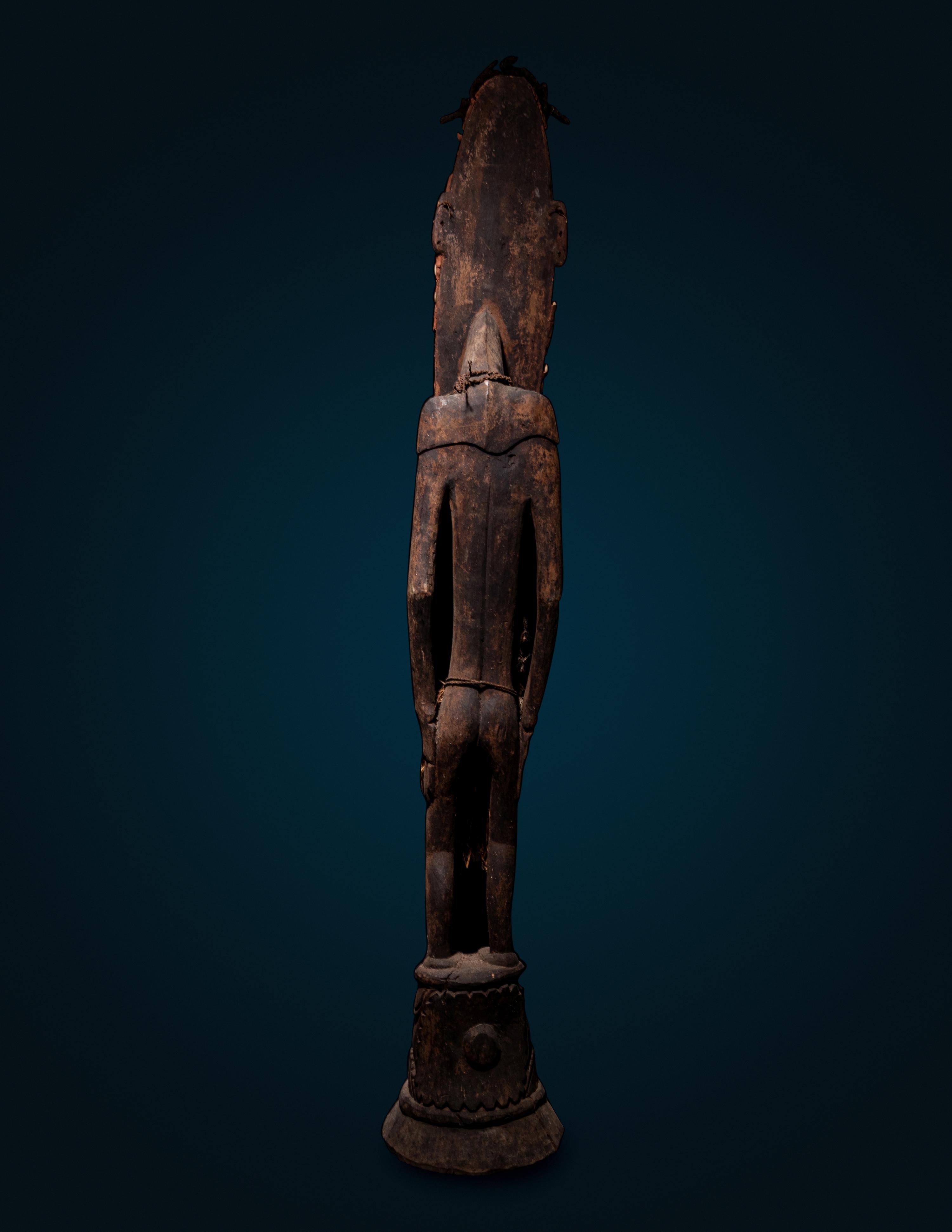 A Kanganamon Wood Standing Figure
