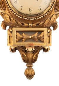 A Continental Giltwood Cartel Clock