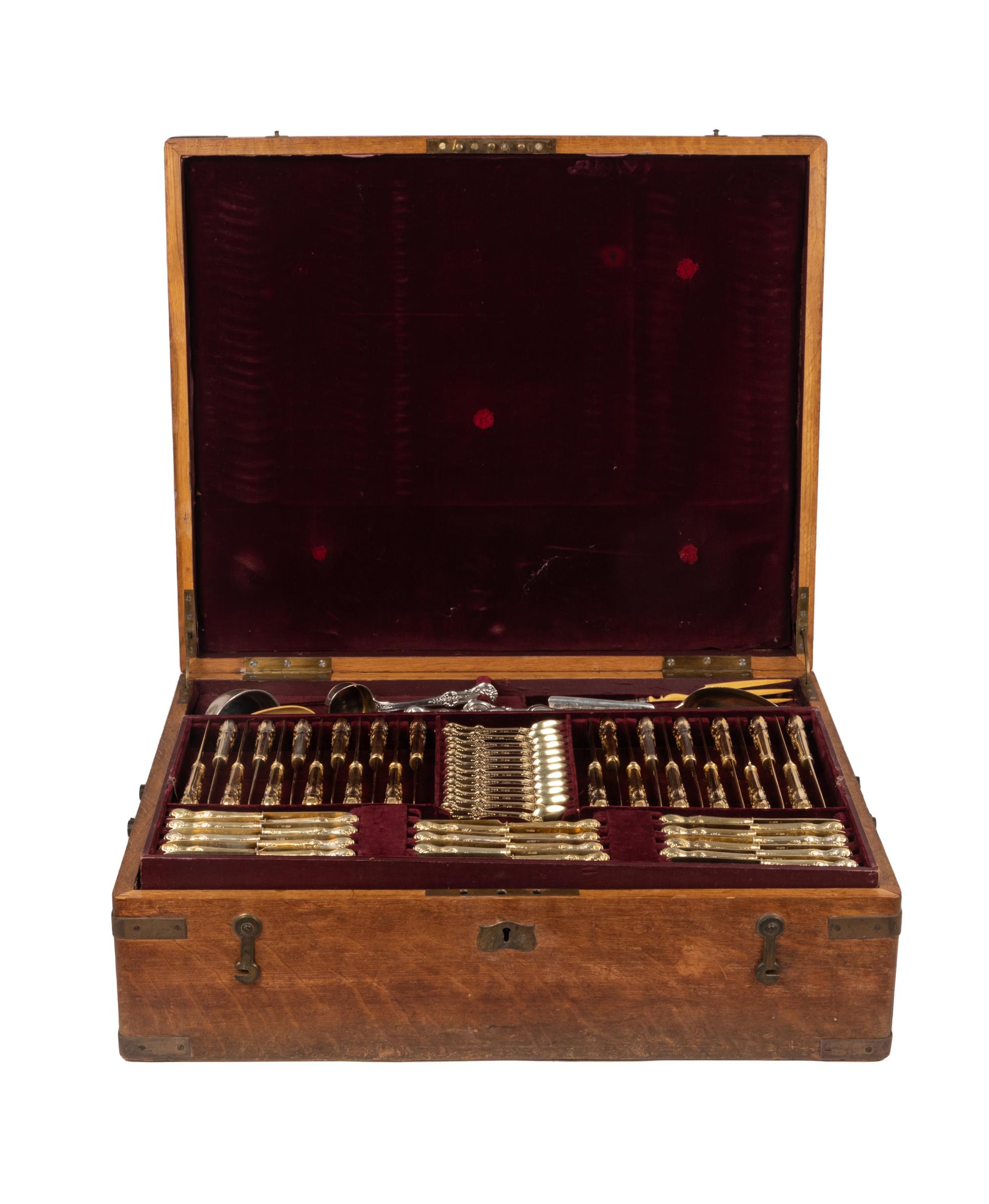 An Extensive Russian Silver and Silver-Gilt Flatware Service in Original Fitted Case