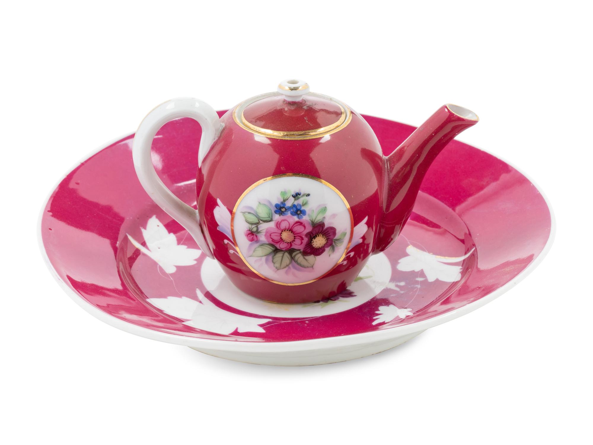 A Gardner Porcelain Teapot and Plate