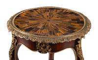 A Napoleon III Gilt Bronze and Inlaid Tiger's Eye Table
