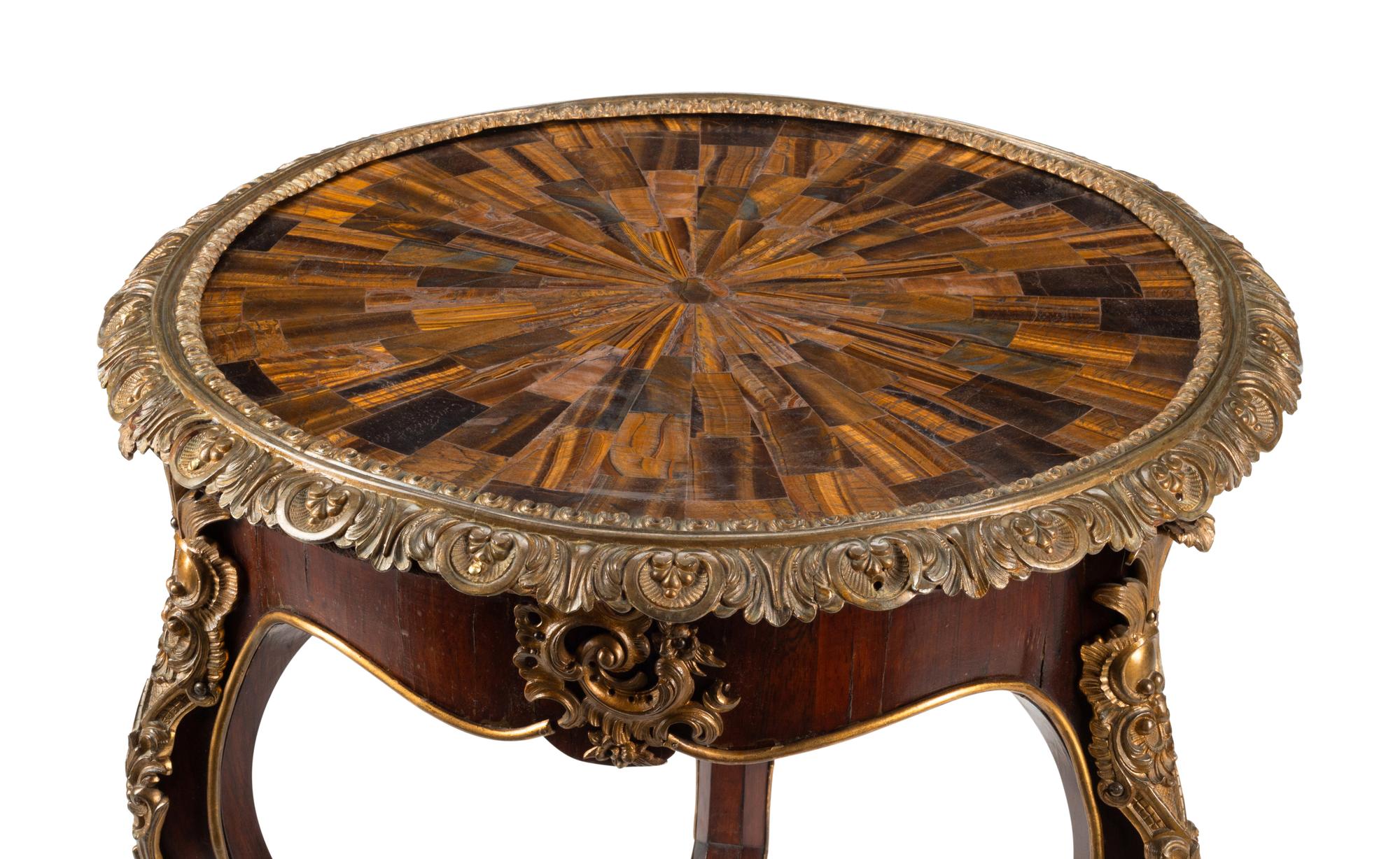 A Napoleon III Gilt Bronze and Inlaid Tiger's Eye Table
