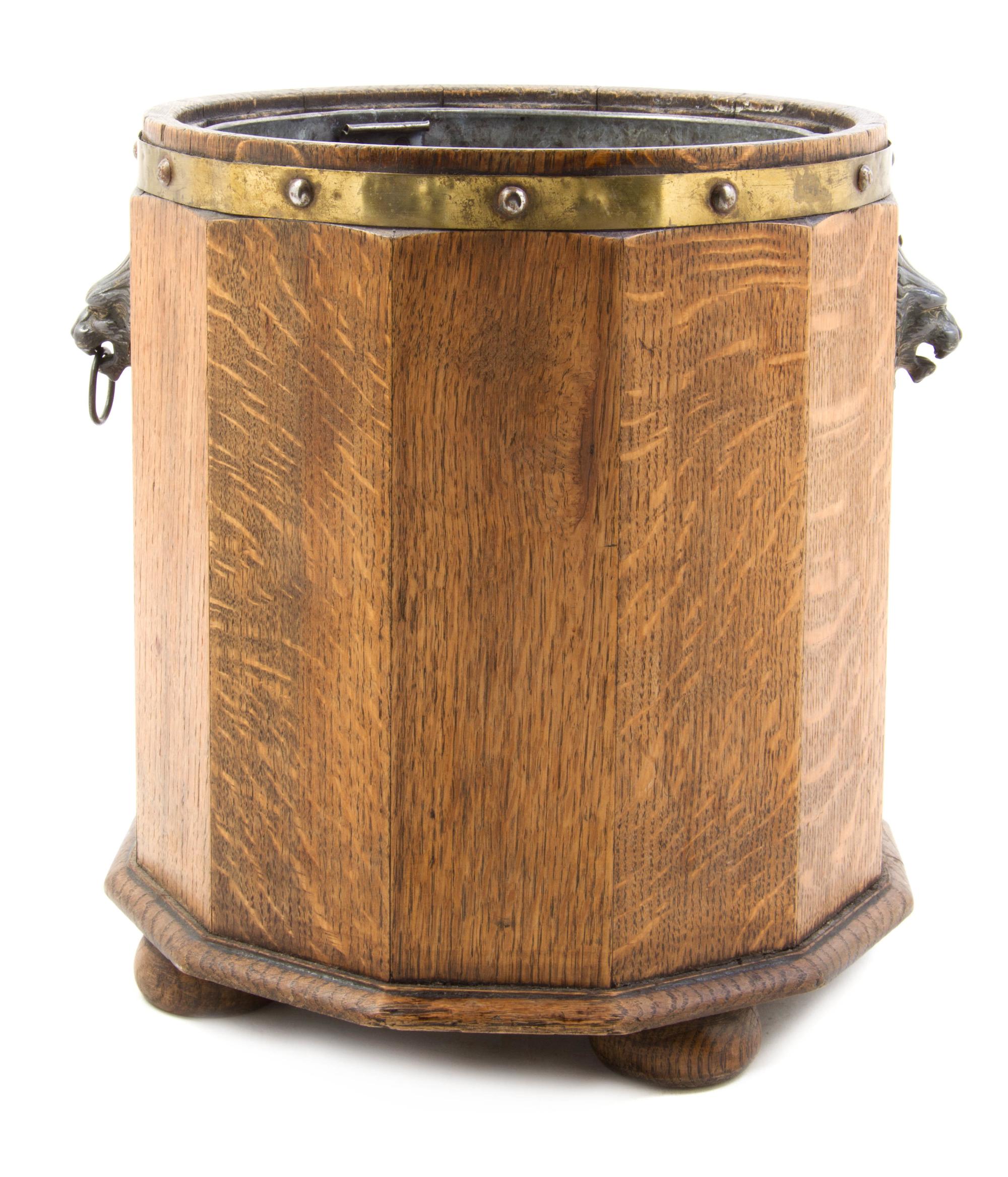An English Brass Mounted Oak Coal Bucket, Height 14 inches.