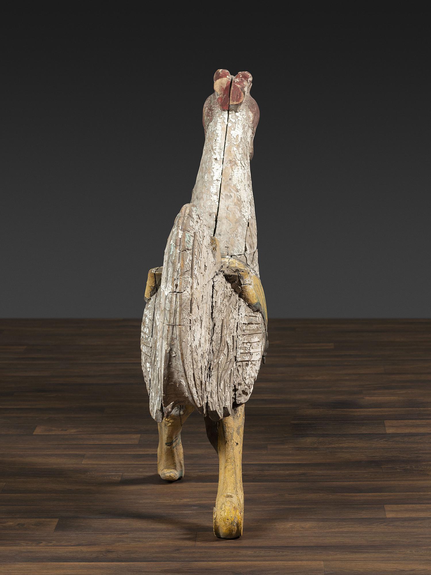 A Carved and Painted Wood Rooster Carousel Figure